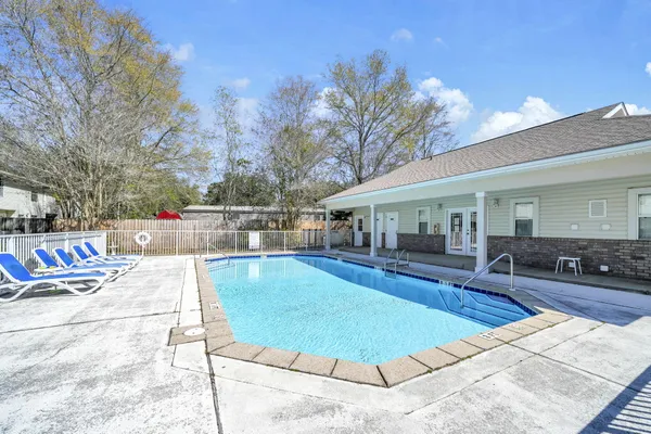 a view of a house with swimming pool