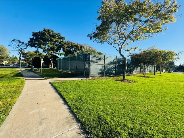 a view of a swimming pool with a garden
