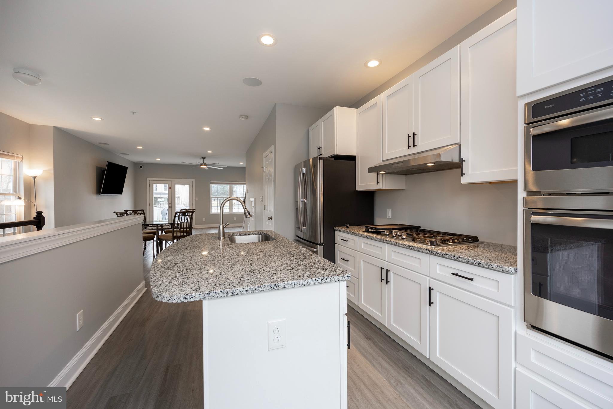 beautiful kitchen with granite counters
