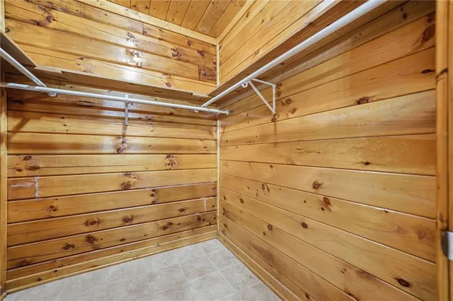 a bathroom with a tub and a sink