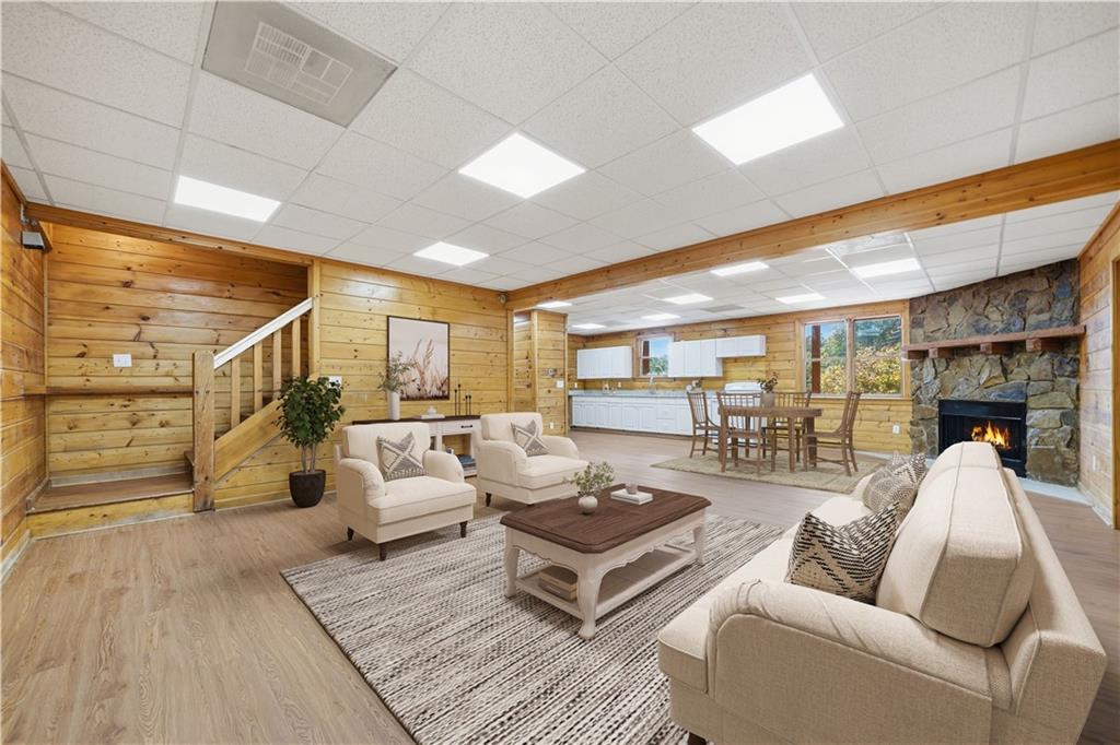 1384 Crystal Lane Northeast Ranger, GA 30734 - Photo 43 of 53 a living room with furniture and a large window