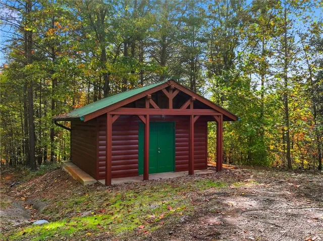 a view of a tree with a yard