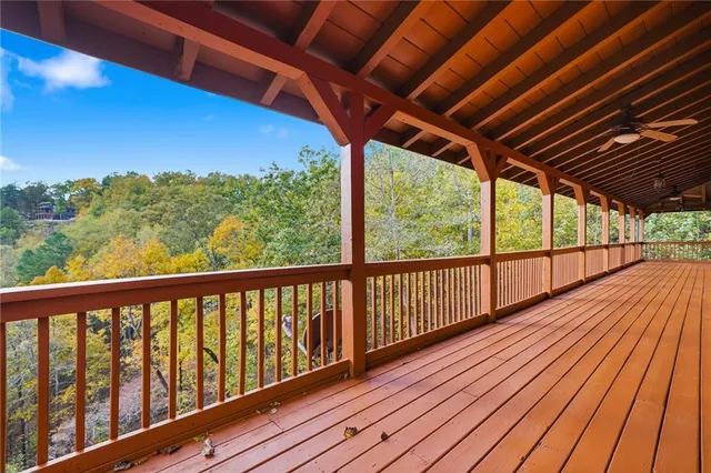 a view of balcony with wooden floor