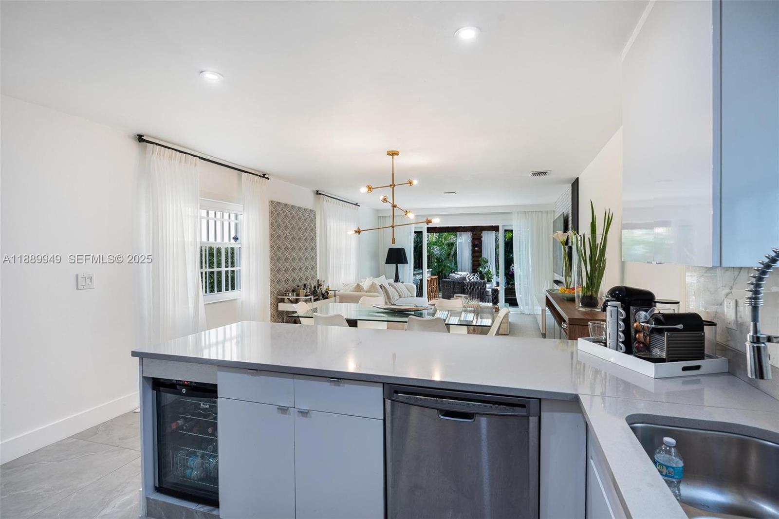 2752 Southwest 11th Street Miami, FL 33135 - Photo 13 of 48 a kitchen with counter top space cabinets and sink