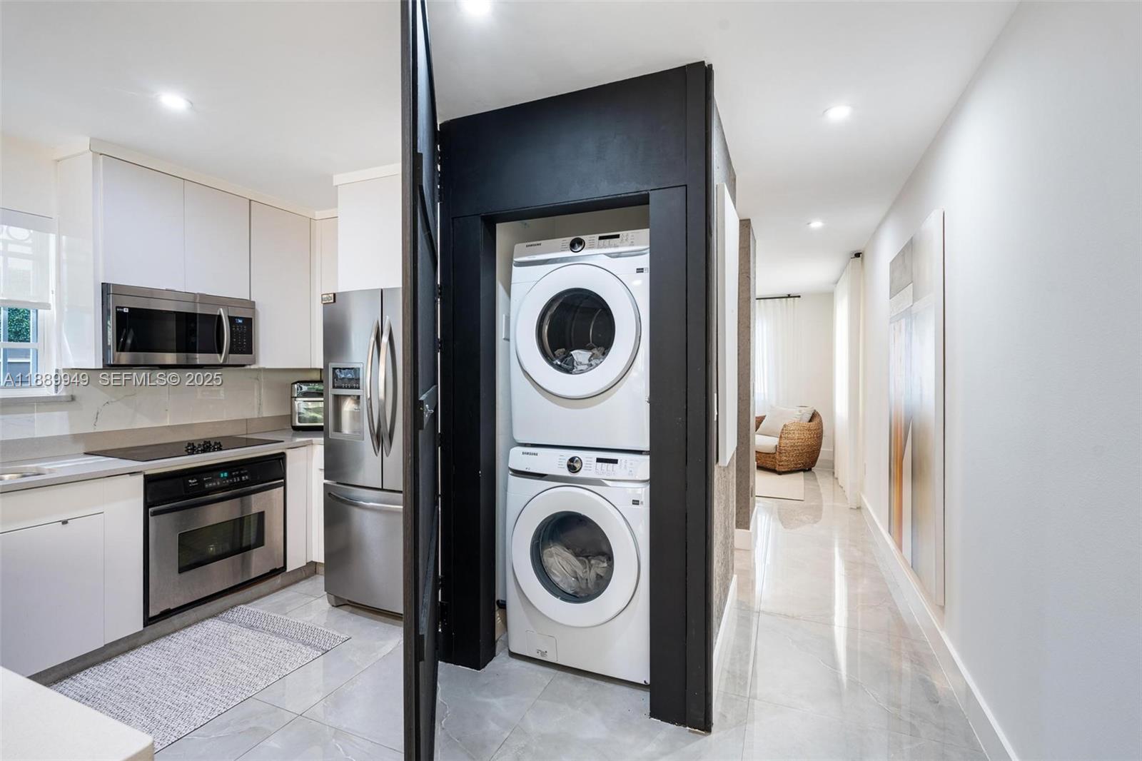 2752 Southwest 11th Street Miami, FL 33135 - Photo 16 of 48 a view of kitchen and washer and dryer