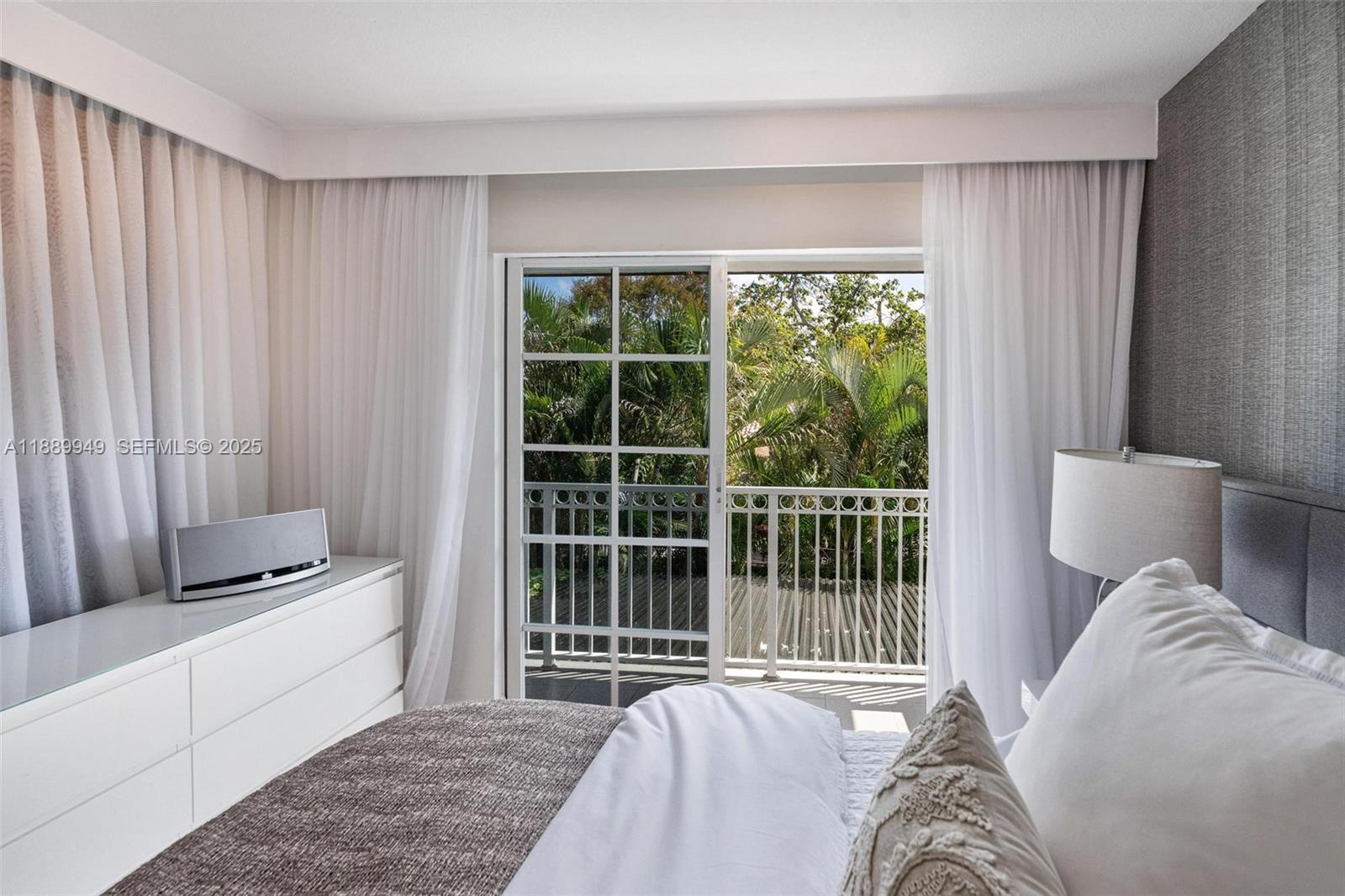 2752 Southwest 11th Street Miami, FL 33135 - Photo 20 of 48 a living room with furniture and a large window