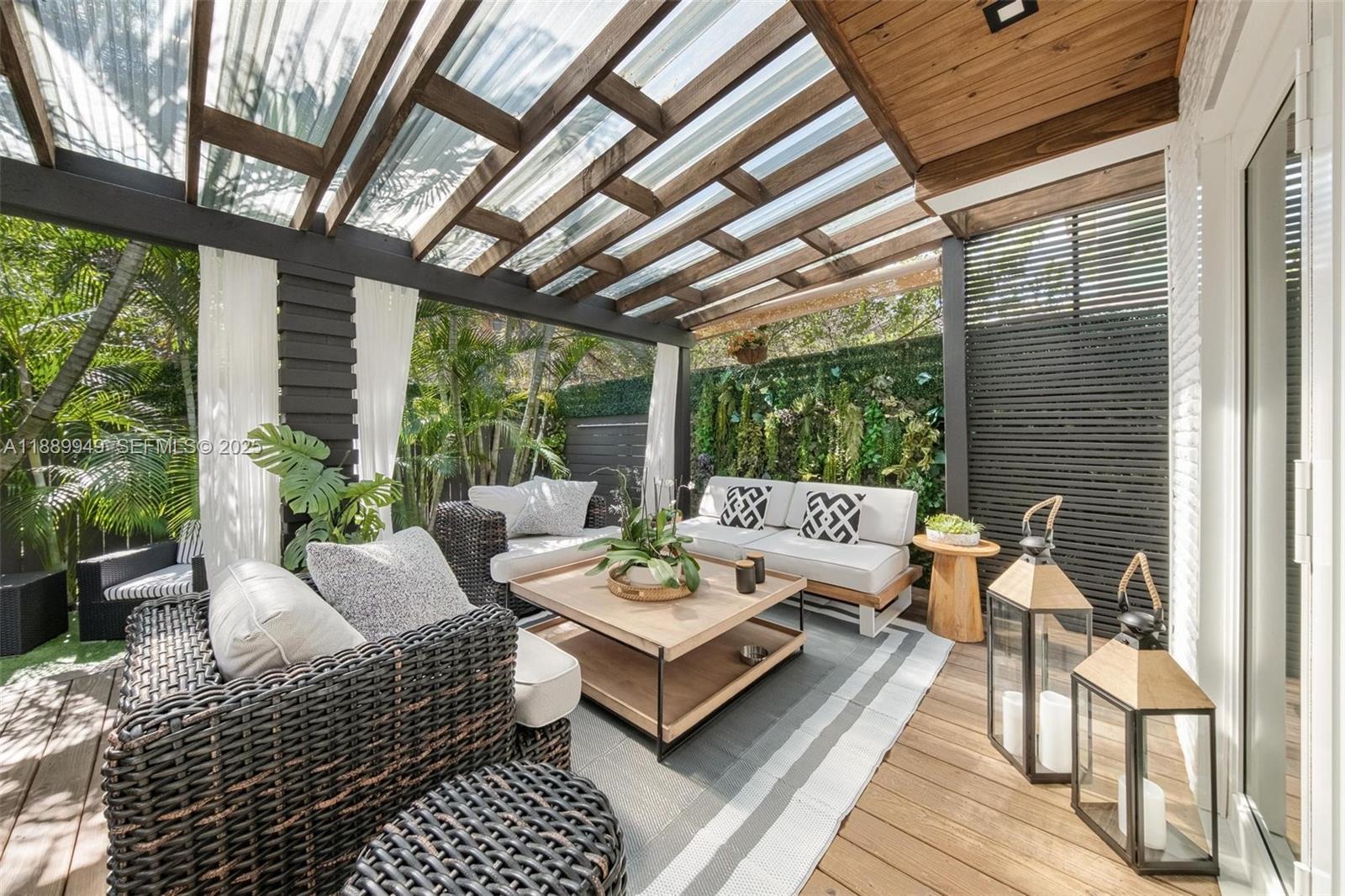 2752 Southwest 11th Street Miami, FL 33135 - Photo 33 of 48 a outdoor living space with furniture and garden view