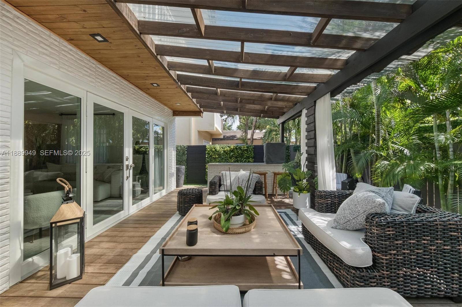 2752 Southwest 11th Street Miami, FL 33135 - Photo 37 of 48 a outdoor living space with furniture and garden view