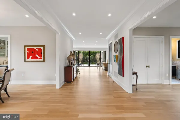 a view of a hallway with stairs