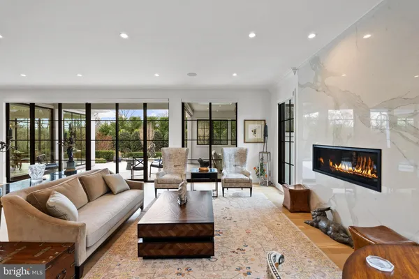 a kitchen with stainless steel appliances granite countertop a stove and more cabinets