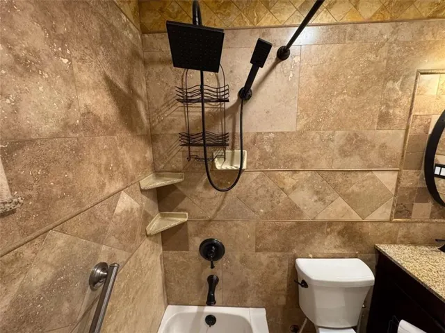 a kitchen with a stove and a microwave