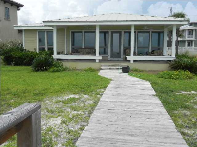 630 Blue Mountain Beach Road Santa Rosa Beach, FL 32459 - Photo 7 of 26 a front view of a house with yard