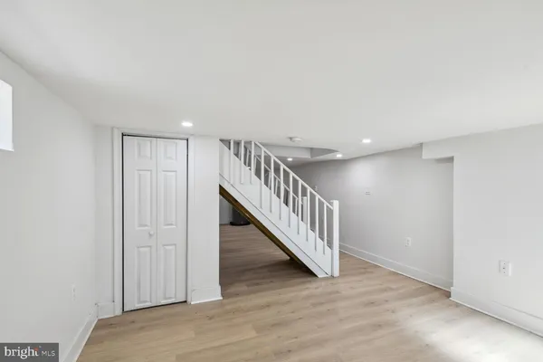 a view of entryway with wooden floor