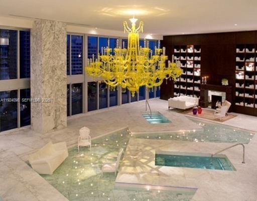 475 Brickell Avenue, Unit 910 Miami, FL 33131 - Photo 8 of 13 a view of a living room with furniture