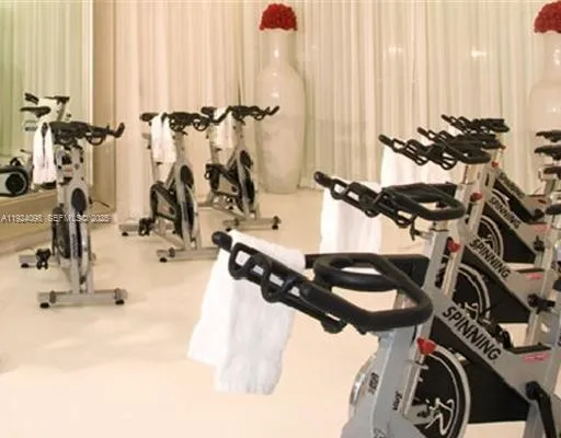 a view of a swimming pool with outdoor seating