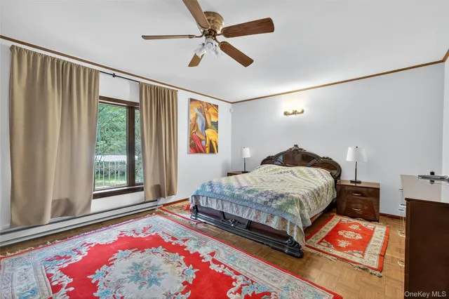 a bedroom with bed and window