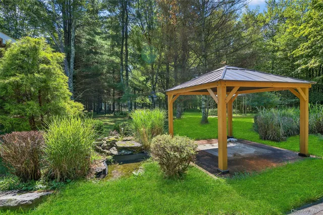 a garden view with a seating space