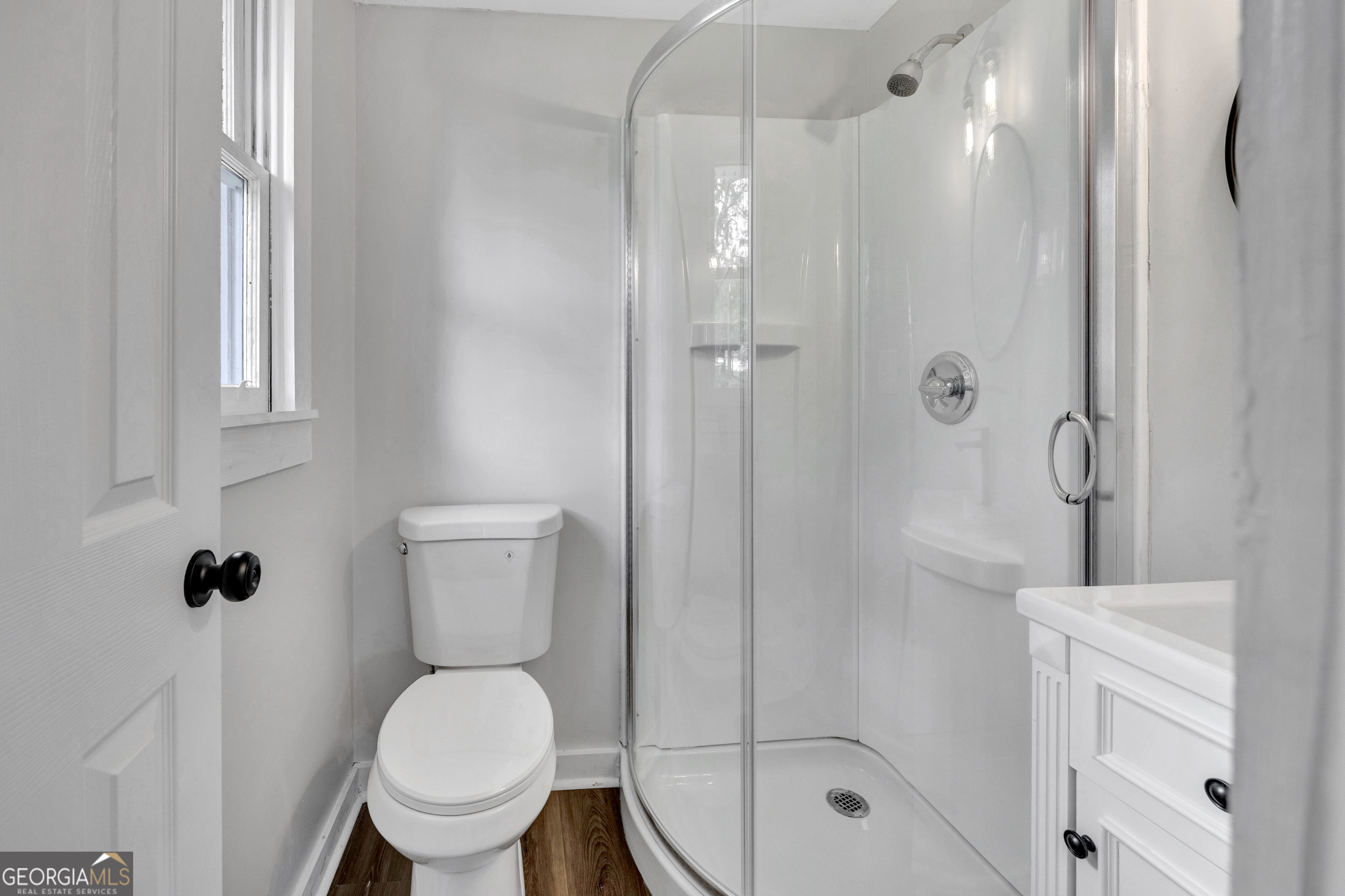 455 Cindy Street Jackson, GA 30233 - Photo 21 of 25 a bathroom with a toilet and a shower