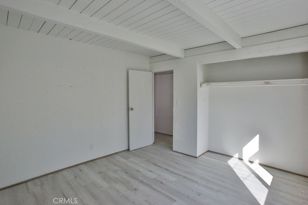 11670 Ferris Road El Monte, CA 91732 - Photo 15 of 25 a view of an empty room with wooden floor