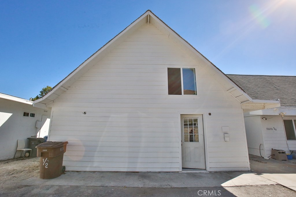 11670 Ferris Road El Monte, CA 91732 - Photo 20 of 25 a view of a house with backyard