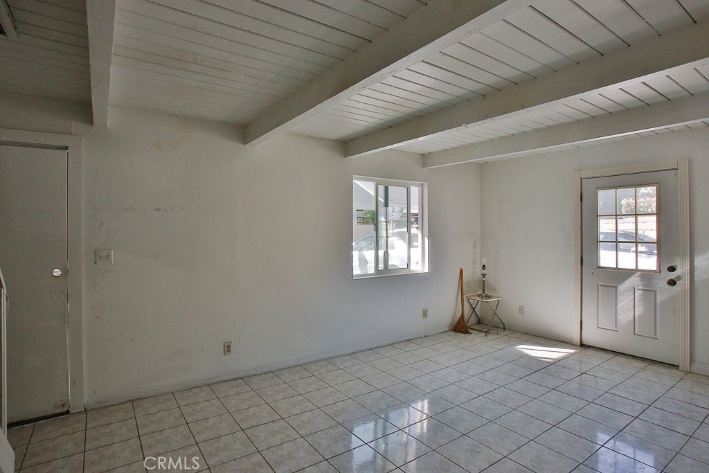 11670 Ferris Road El Monte, CA 91732 - Photo 23 of 25 an empty room with windows