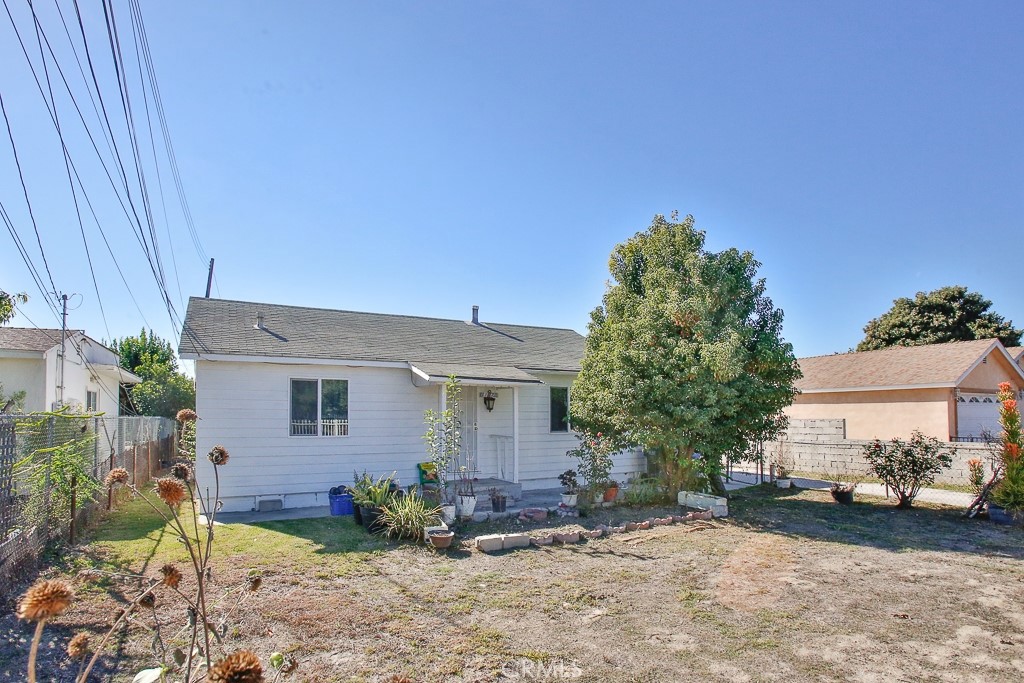 11670 Ferris Road El Monte, CA 91732 - Photo 25 of 25 a front view of a house with garden