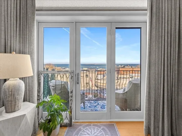 a view of a balcony and chair