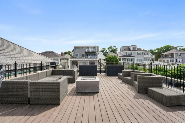 a view of a roof deck with couches