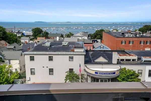 an aerial view of a house with an outdoor space