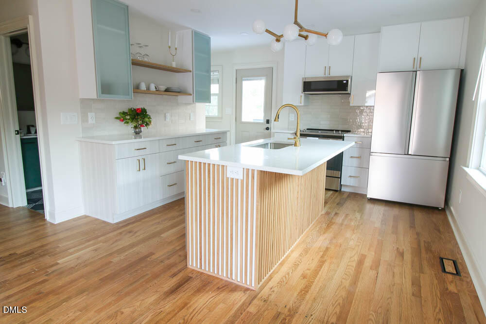 2406 Boswell Road Raleigh, NC 27610 - Photo 9 of 26 kitchen-island-view
