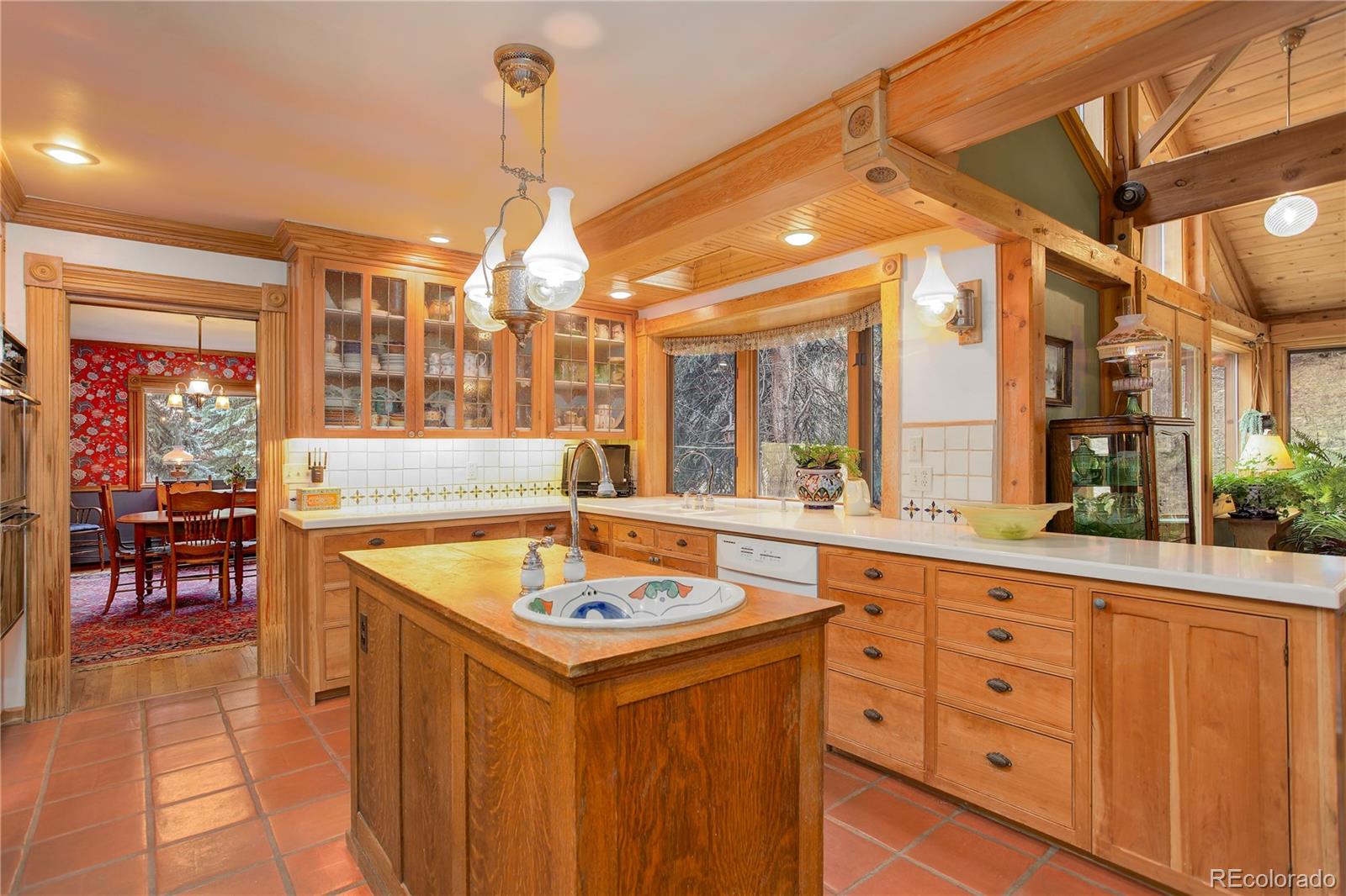 1730 Upper Bear Creek Road Evergreen, CO 80439 - Photo 20 of 40 a very nice looking kitchen with a large window
