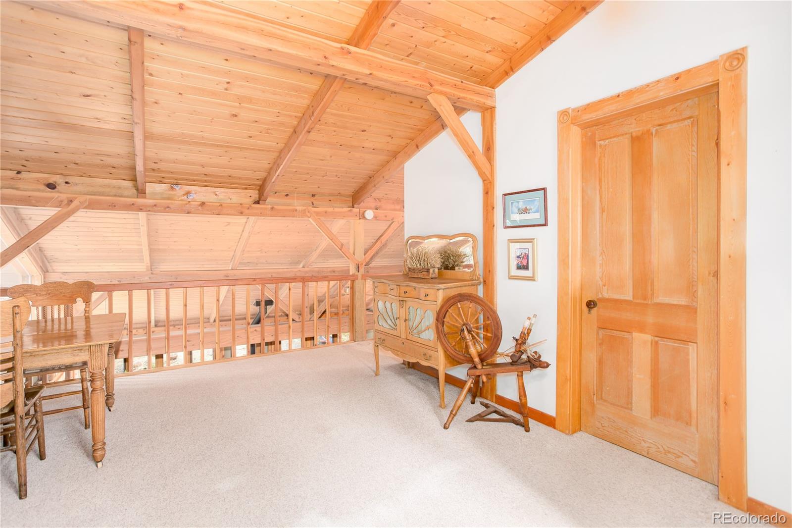 1730 Upper Bear Creek Road Evergreen, CO 80439 - Photo 27 of 40 a view of a room with gym equipment