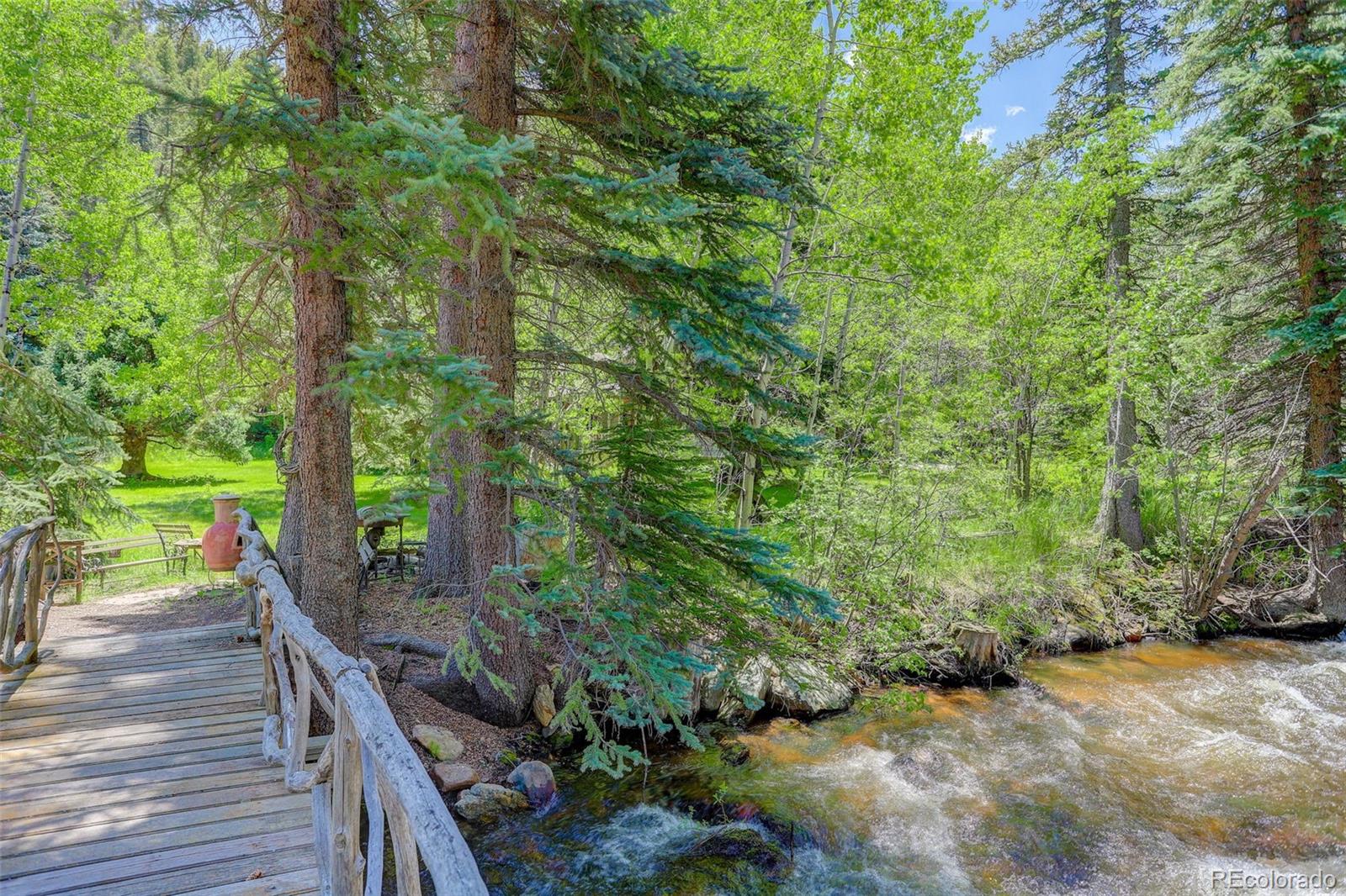 1730 Upper Bear Creek Road Evergreen, CO 80439 - Photo 6 of 40 a view of an outdoor space with a patio