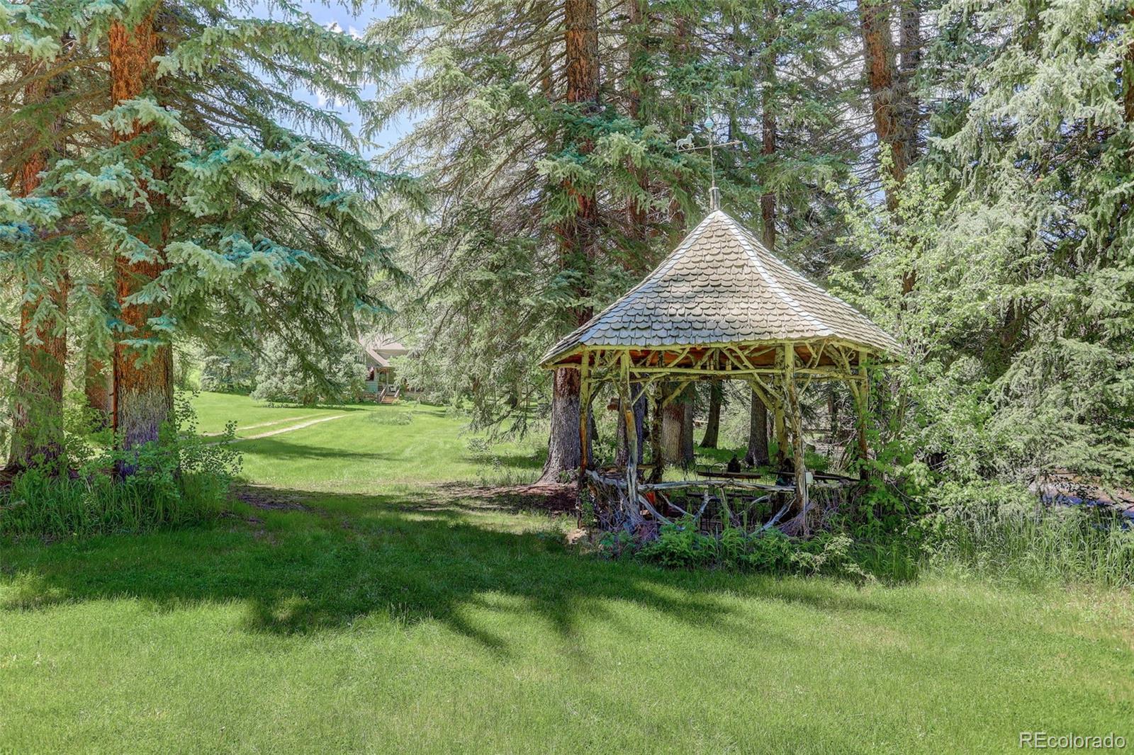 1730 Upper Bear Creek Road Evergreen, CO 80439 - Photo 9 of 40 a view of outdoor space yard and deck