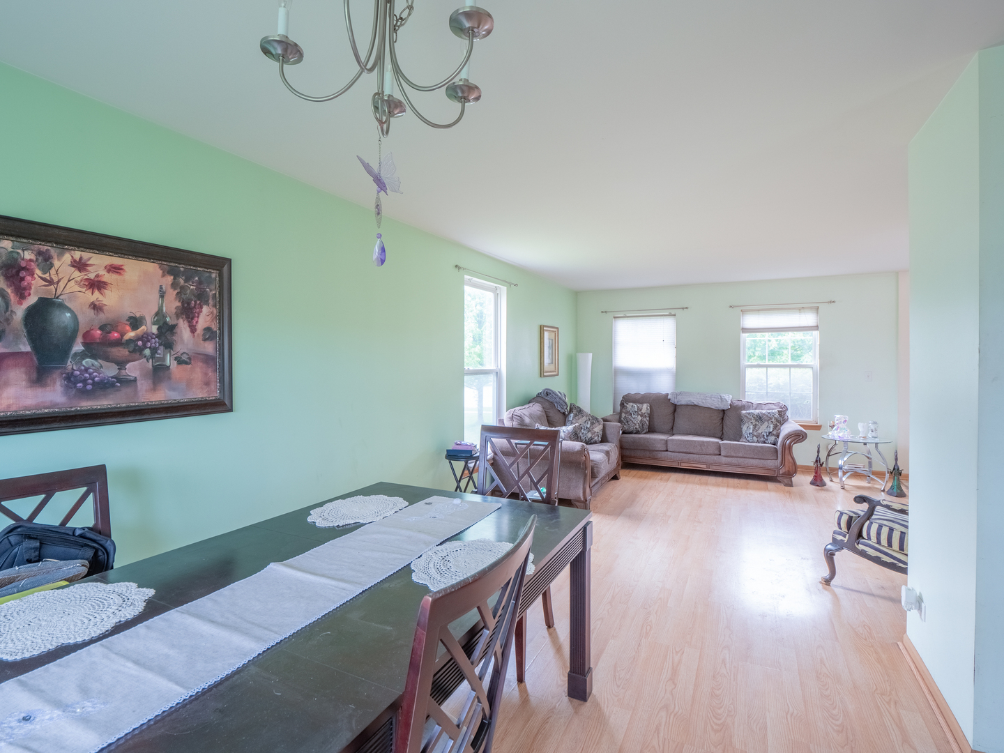 26956 West Hemlock Road Channahon, IL 60410 - Photo 3 of 17 a living room with furniture and a wooden floor