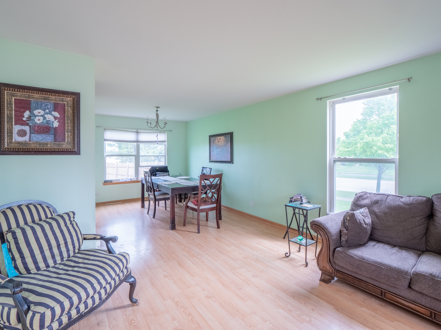 26956 West Hemlock Road Channahon, IL 60410 - Photo 4 of 17 a living room with furniture and a large window