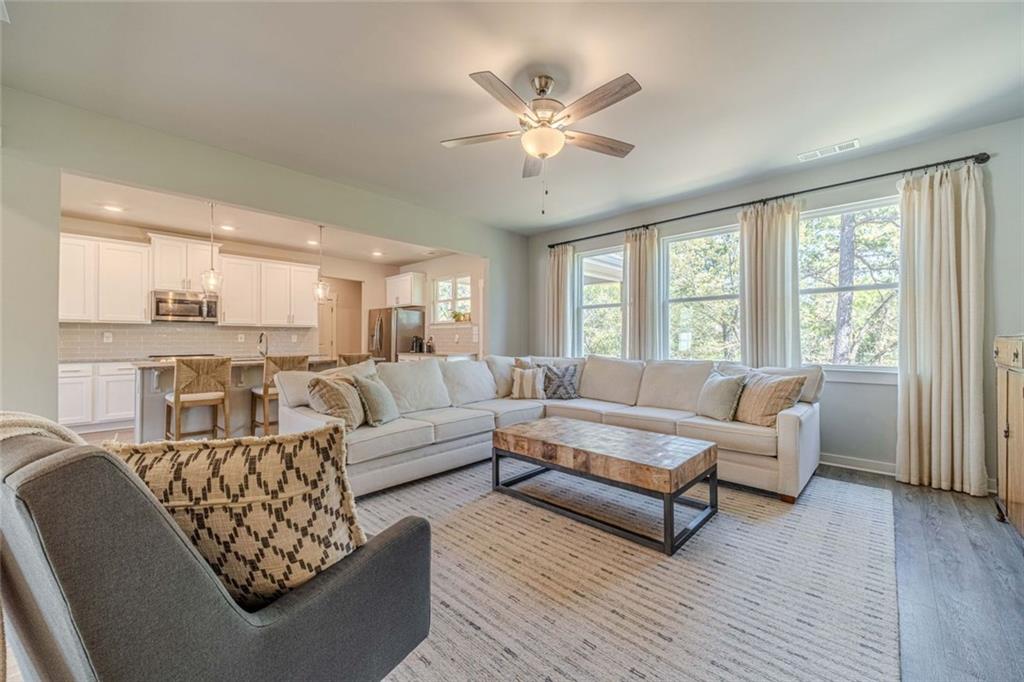 4070 Links Boulevard Jefferson, GA 30549 - Photo 18 of 46 a living room with furniture and a large window