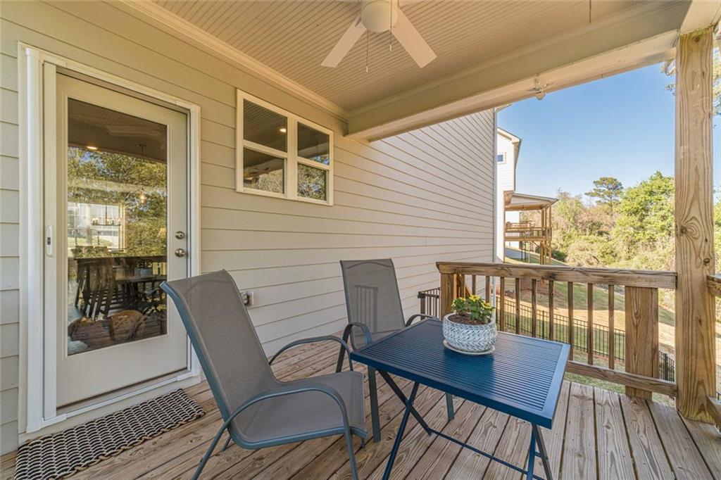 4070 Links Boulevard Jefferson, GA 30549 - Photo 20 of 46 a view of a deck with furniture and wooden floor