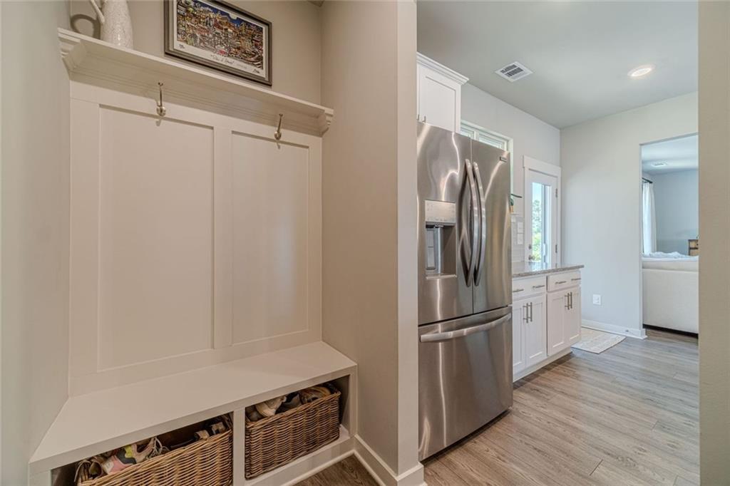 4070 Links Boulevard Jefferson, GA 30549 - Photo 22 of 46 a kitchen with stainless steel appliances a refrigerator and cabinets