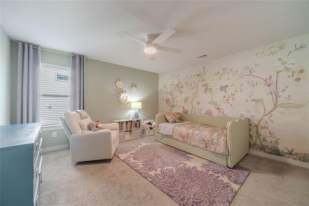 4070 Links Boulevard Jefferson, GA 30549 - Photo 36 of 46 a living room with furniture and a large window