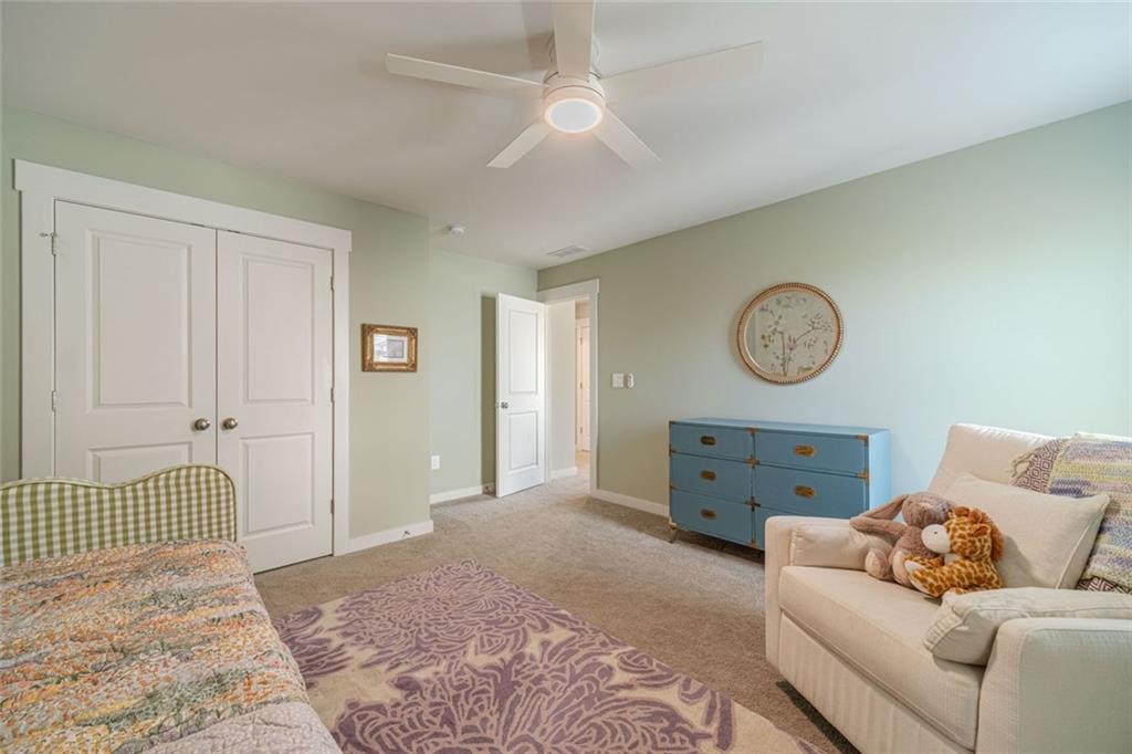 4070 Links Boulevard Jefferson, GA 30549 - Photo 37 of 46 a bedroom with a bed and a window