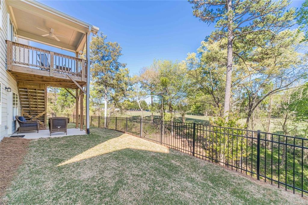 4070 Links Boulevard Jefferson, GA 30549 - Photo 4 of 46 a lake view with a building in the background