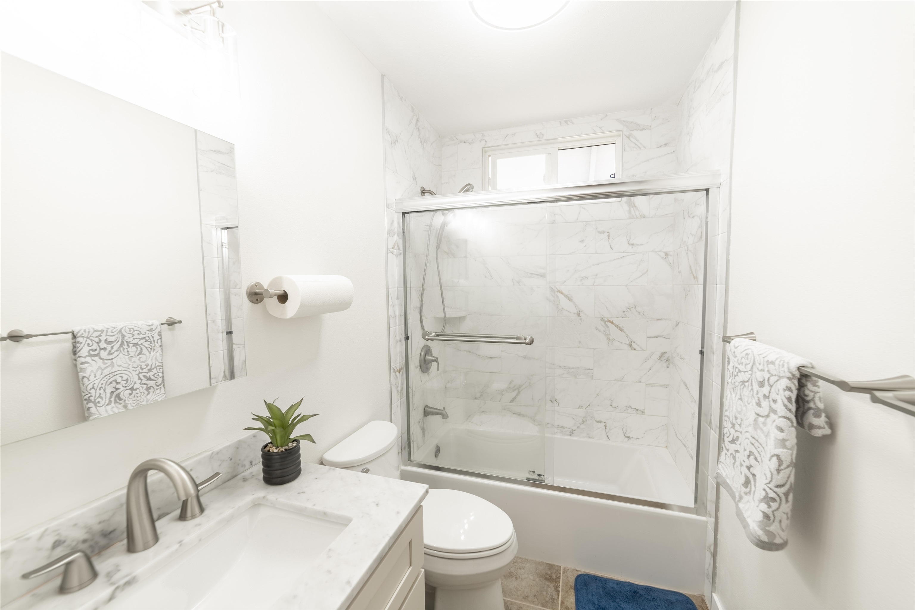 5332 Lower Honoapiilani Road Lahaina, HI 96761 - Photo 18 of 36 a bathroom with a granite countertop sink a toilet and shower