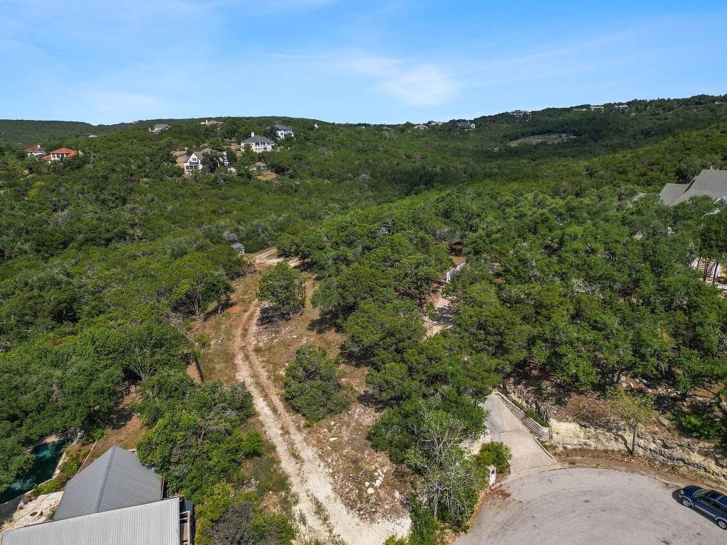 6002 Lost Trail Cove Austin, TX 78730 - Photo 26 of 28 a view of a lush green space with sea
