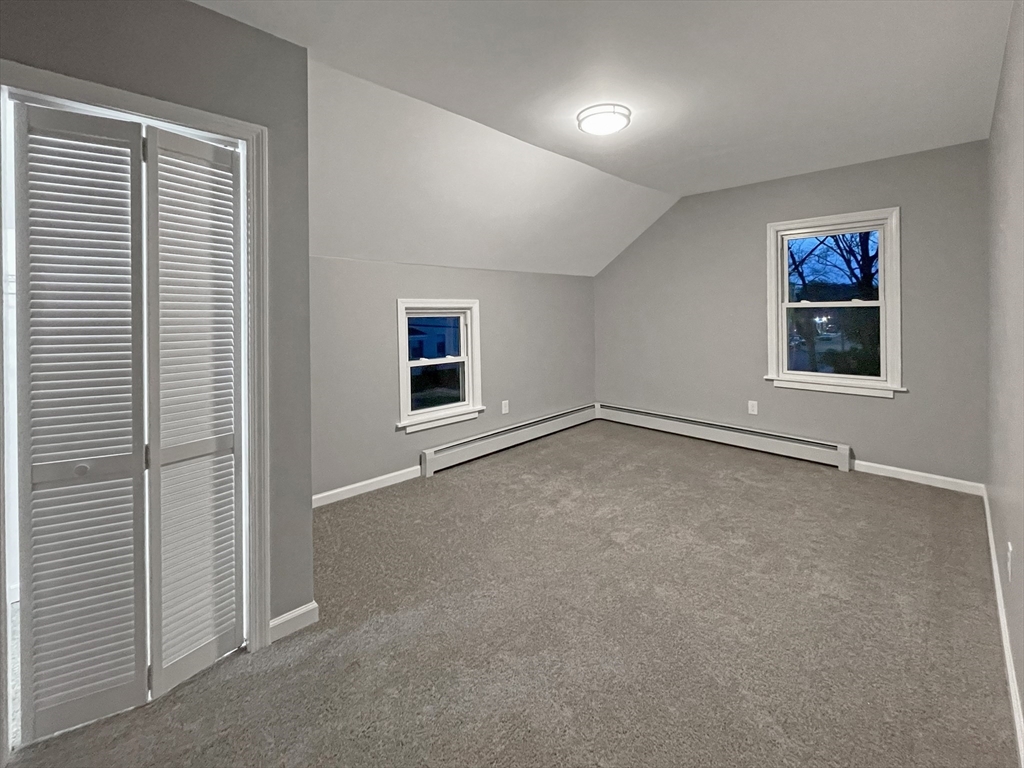 1342 Worcester Street Springfield, MA 01151 - Photo 30 of 40 an empty room with windows