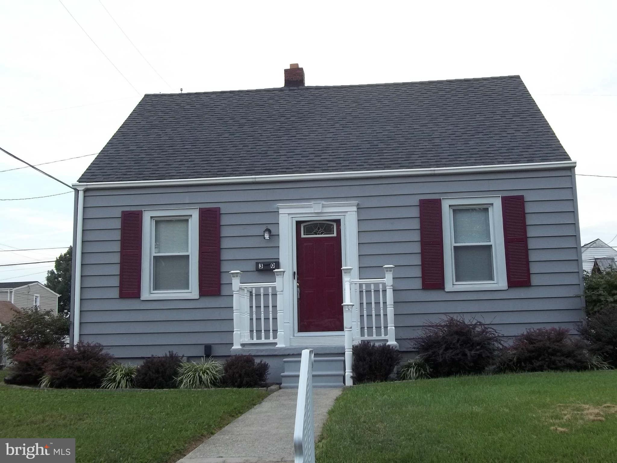 30 Crafton Road Baltimore, MD 21221 - Photo 1 of 17 a house that has a lot of windows in it