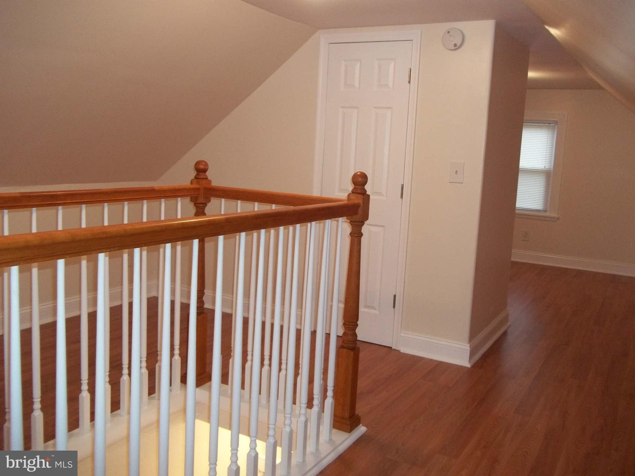 30 Crafton Road Baltimore, MD 21221 - Photo 11 of 17 a view of a hallway with wooden floor