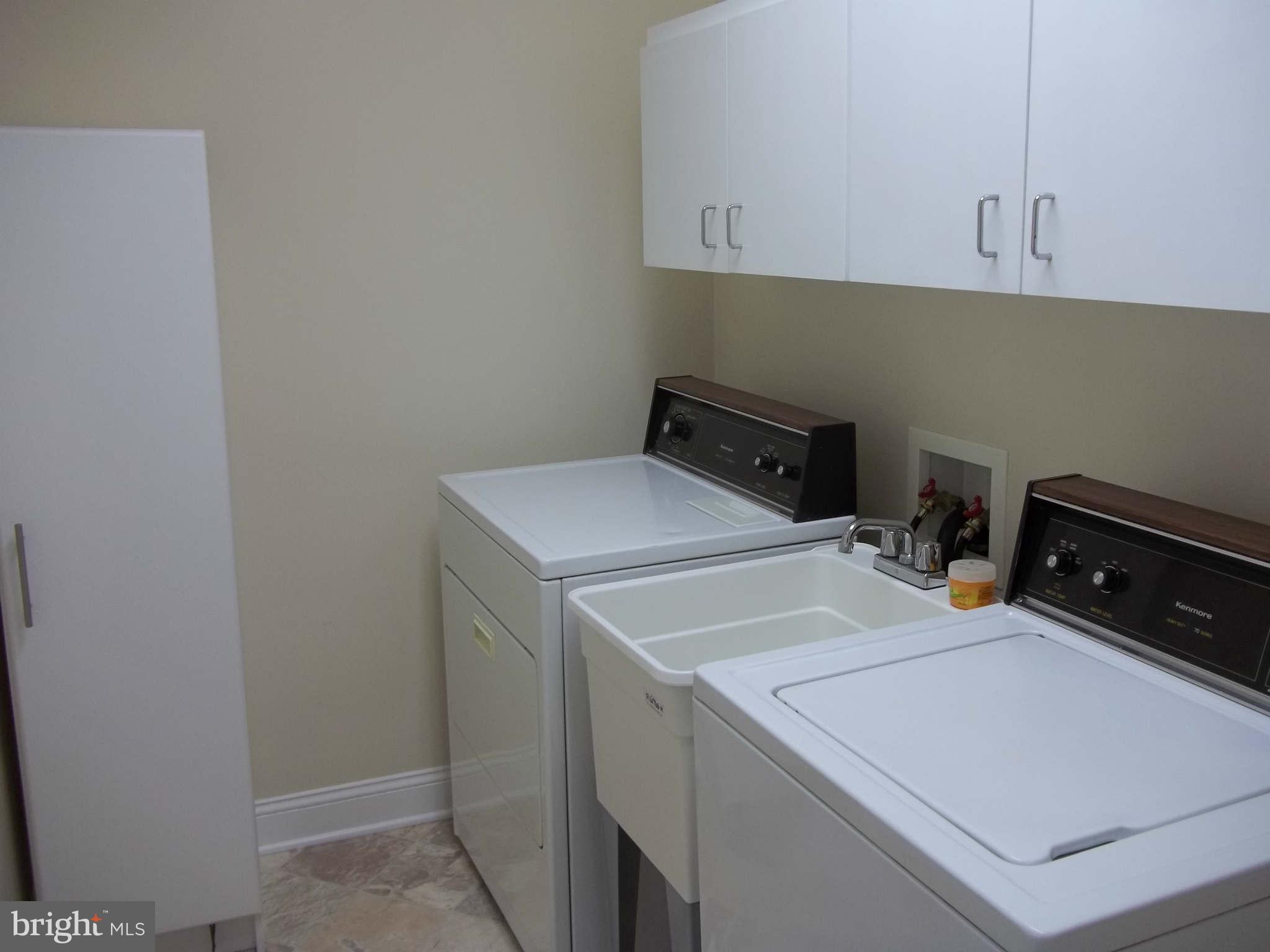 30 Crafton Road Baltimore, MD 21221 - Photo 17 of 17 a utility room with dryer and washer