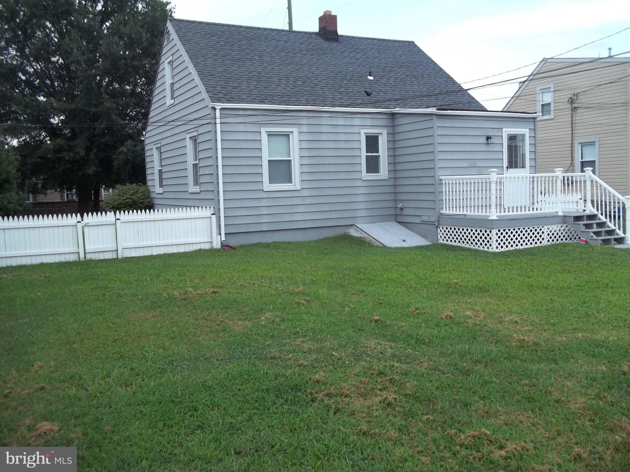 30 Crafton Road Baltimore, MD 21221 - Photo 3 of 17 a view of a house with a backyard