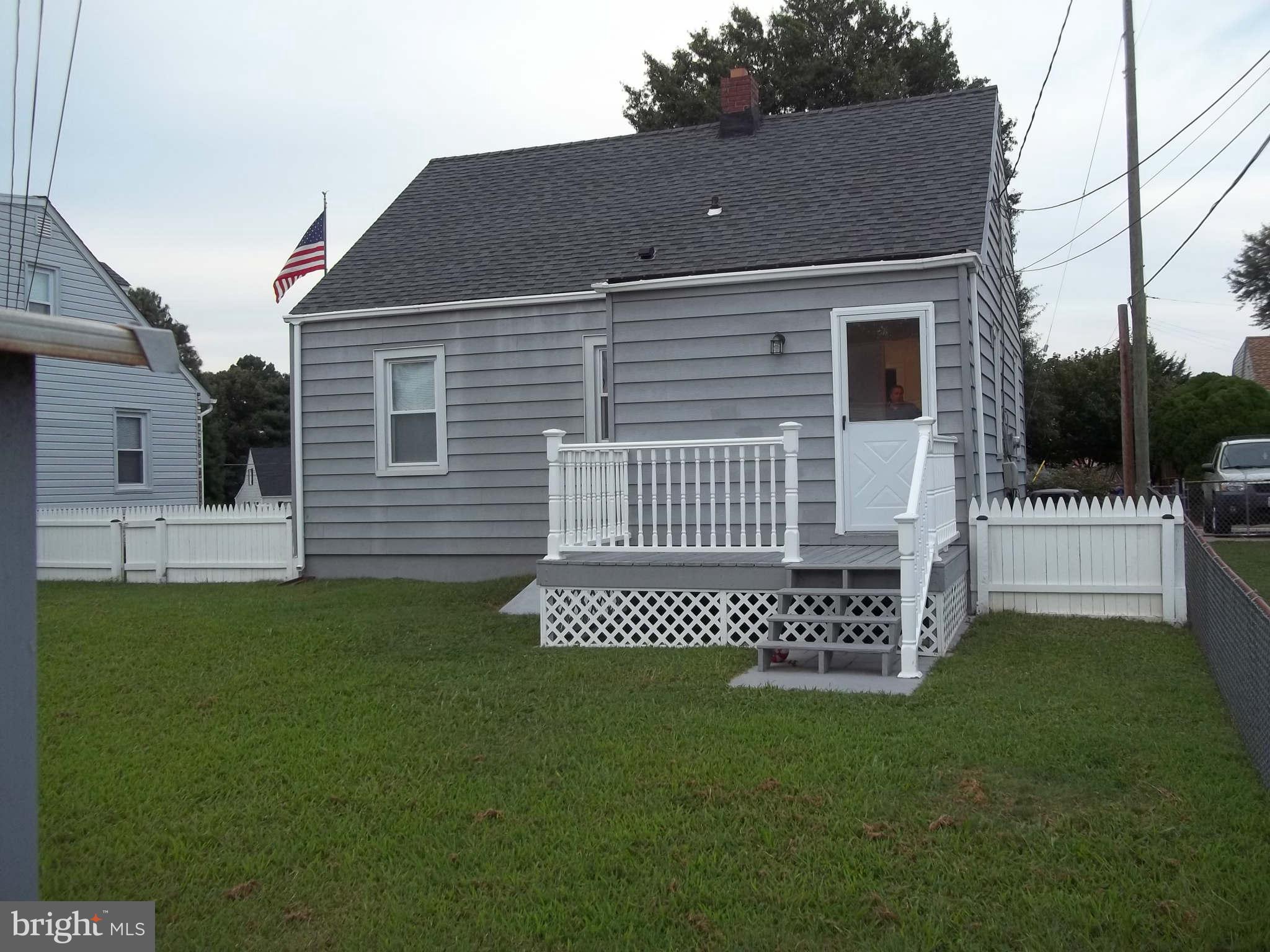 30 Crafton Road Baltimore, MD 21221 - Photo 4 of 17 a view of a house with a yard